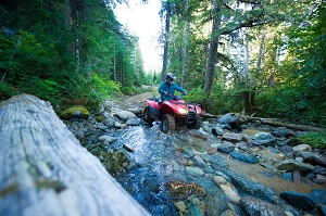 atv riding on rocks